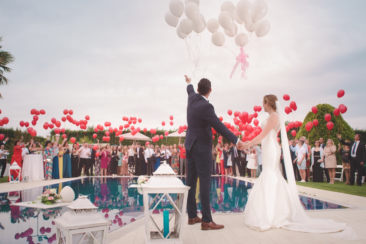 Outdoor wedding celebration surrounded by nature
